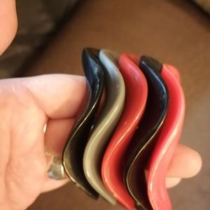Circa 1980's wavy plastic bracelets